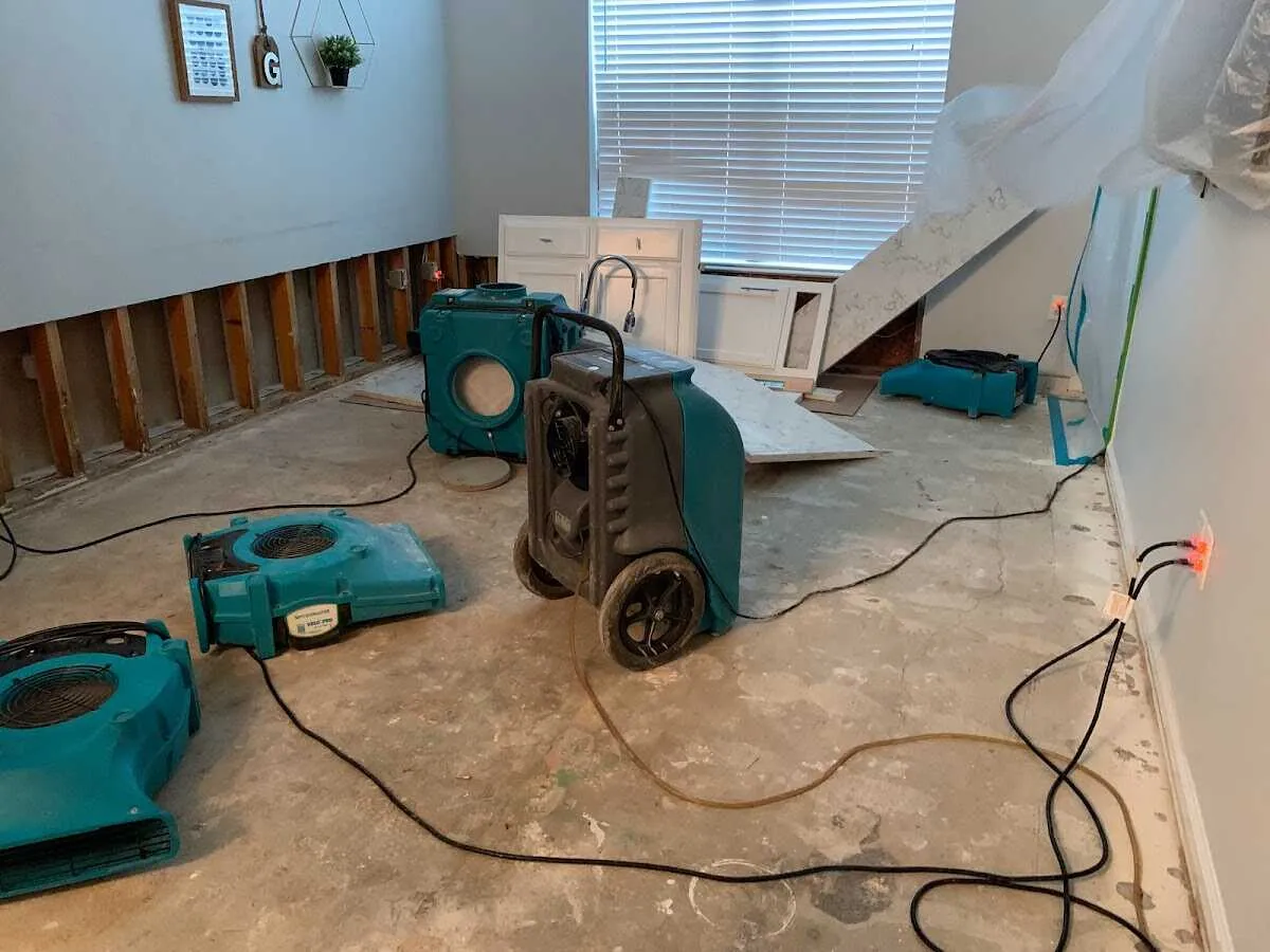 Dehumidifier in flood-cut room for Water Damage Restoration in Byram